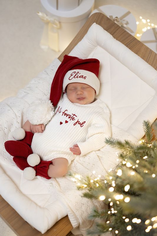Julebooties med hvite pompom dusker